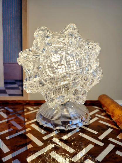 a vintage Murano glass table lamp with starburst shape