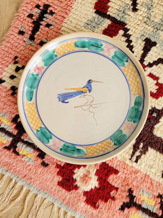 full view of a ceramic (wall) plate from Tuscany with a bird