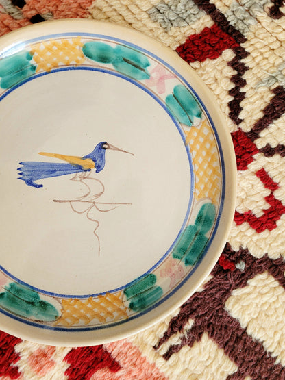 detail of a ceramic (wall) plate from Tuscany with a bird
