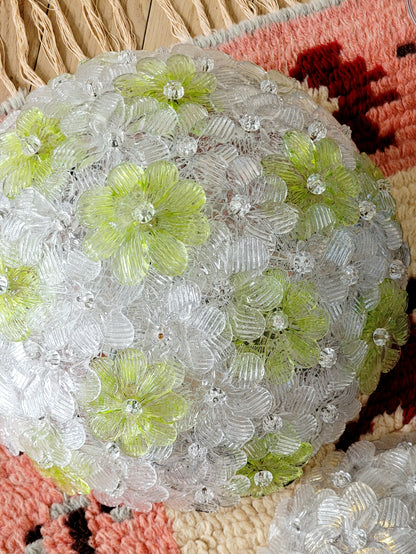 top view of a vintage Murano flower ceiling lamp with clear and green floral petals