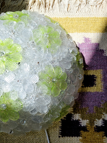 top view of a vintage Murano flower ceiling lamp with clear and green floral petals