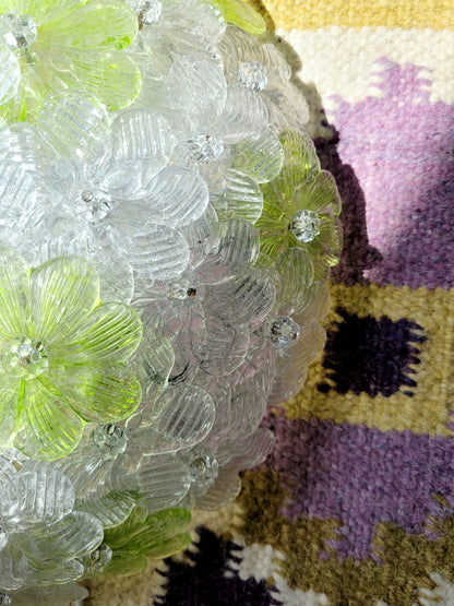 top view of a vintage Murano flower ceiling lamp with clear and green floral petals