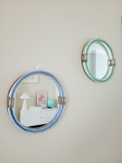 full front view of 2 vintage Italian mirrors with a twisted glass frame