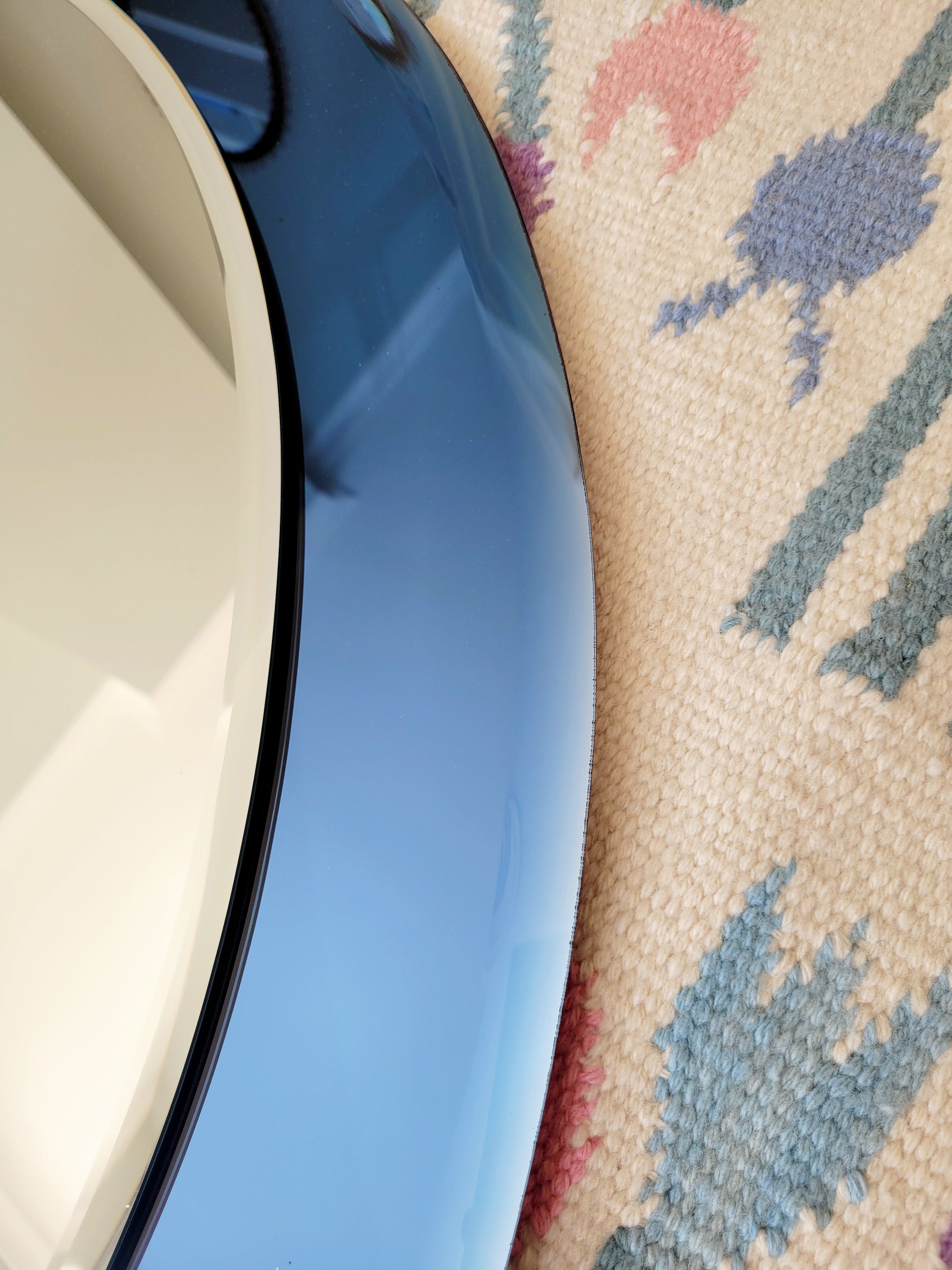 Italian mirror featuring a distinctive light blue frame