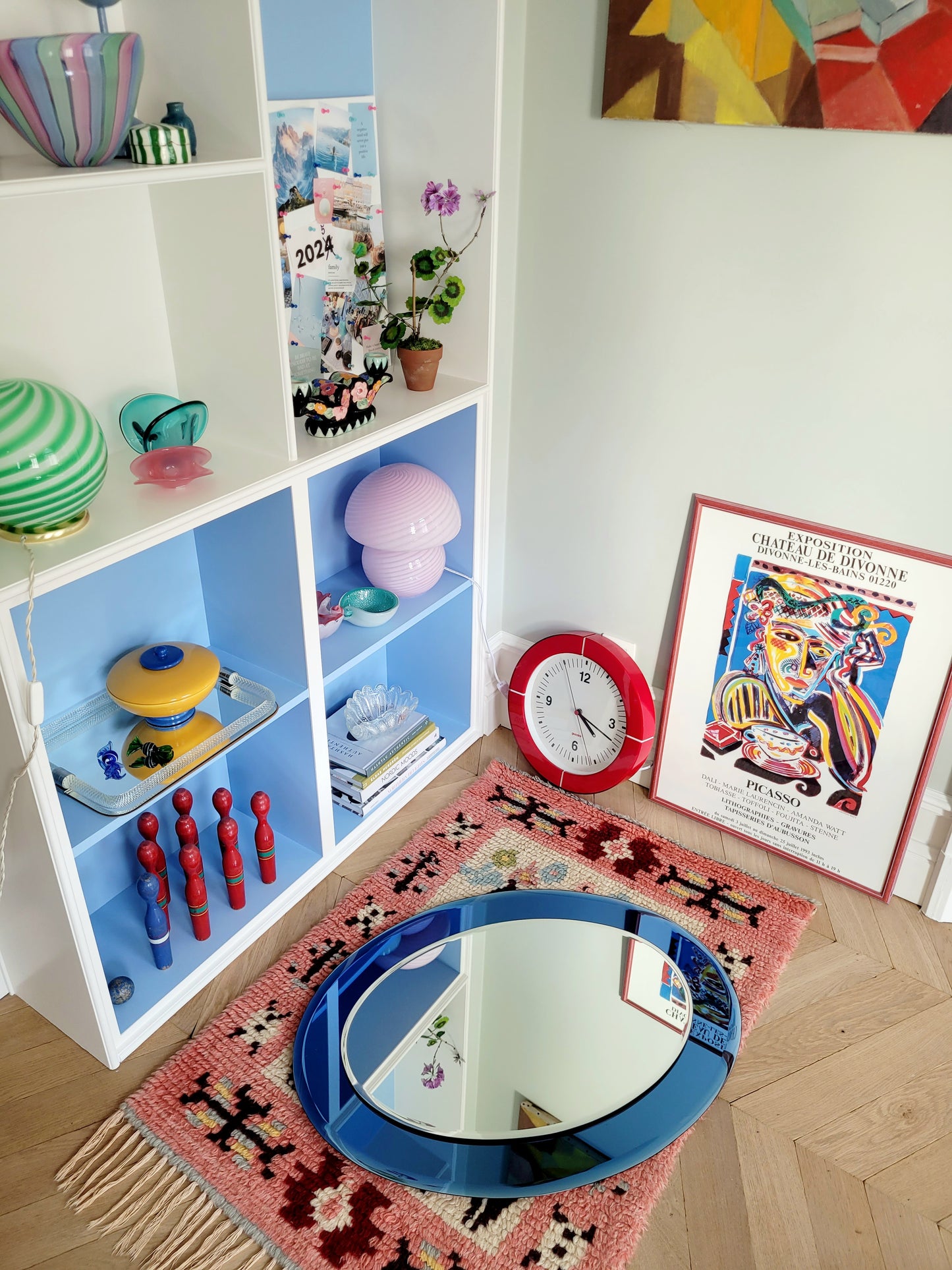 Italian mirror featuring a distinctive light blue frame