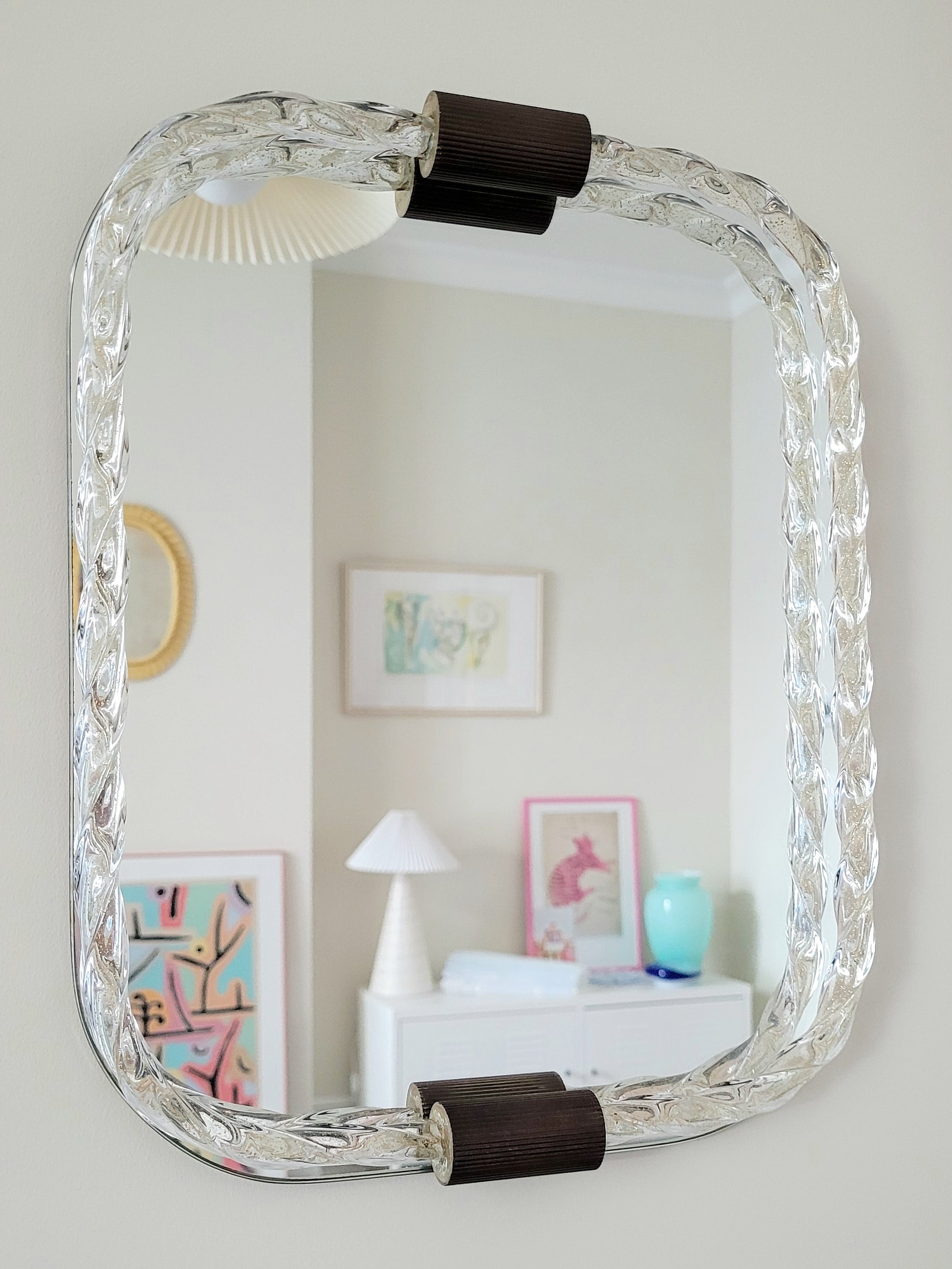 vintage Italian mirror, accentuated by a twisted frame of clear/golden Murano glass