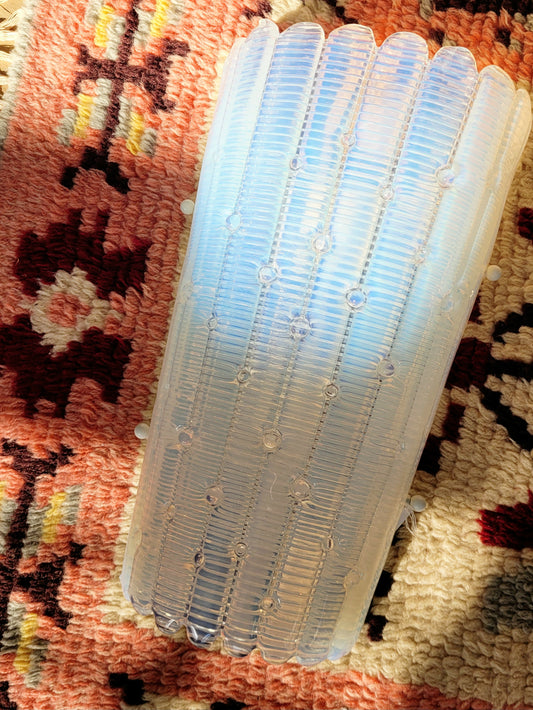 top view of an opalescent Murano glass wall light