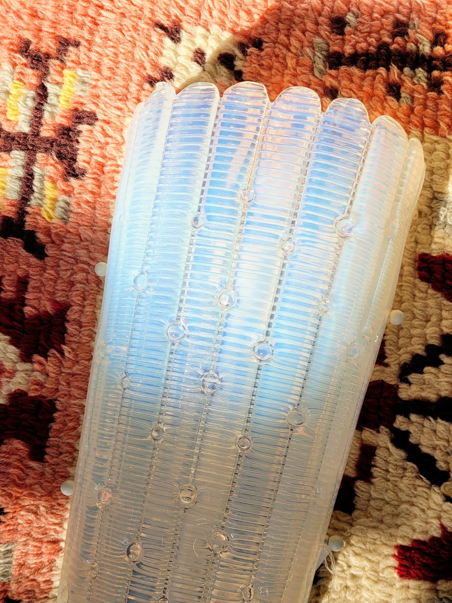 top view of an opalescent Murano glass wall light