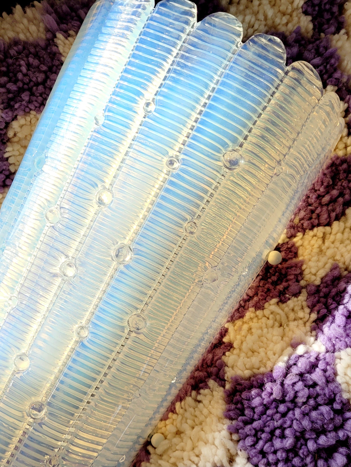 detailed view of an opalescent Murano glass wall light