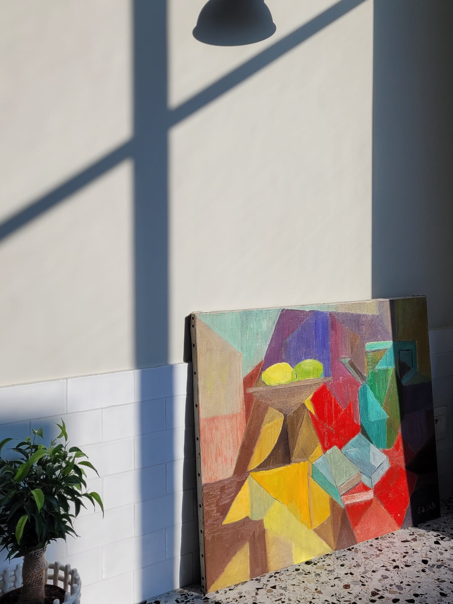 side view of a vibrant oil painting "Nature morte" (still life) signed by S. de Capá showing stylistic cubism traits