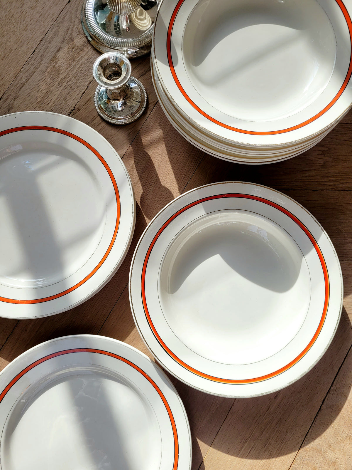 Red striped dinner plates from Boch Frères, Belgium