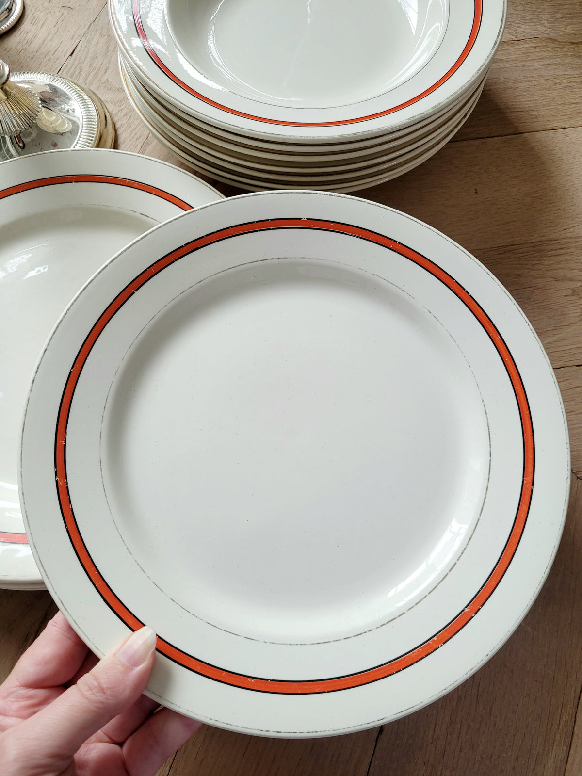 Red striped dinner plates from Boch Frères, Belgium