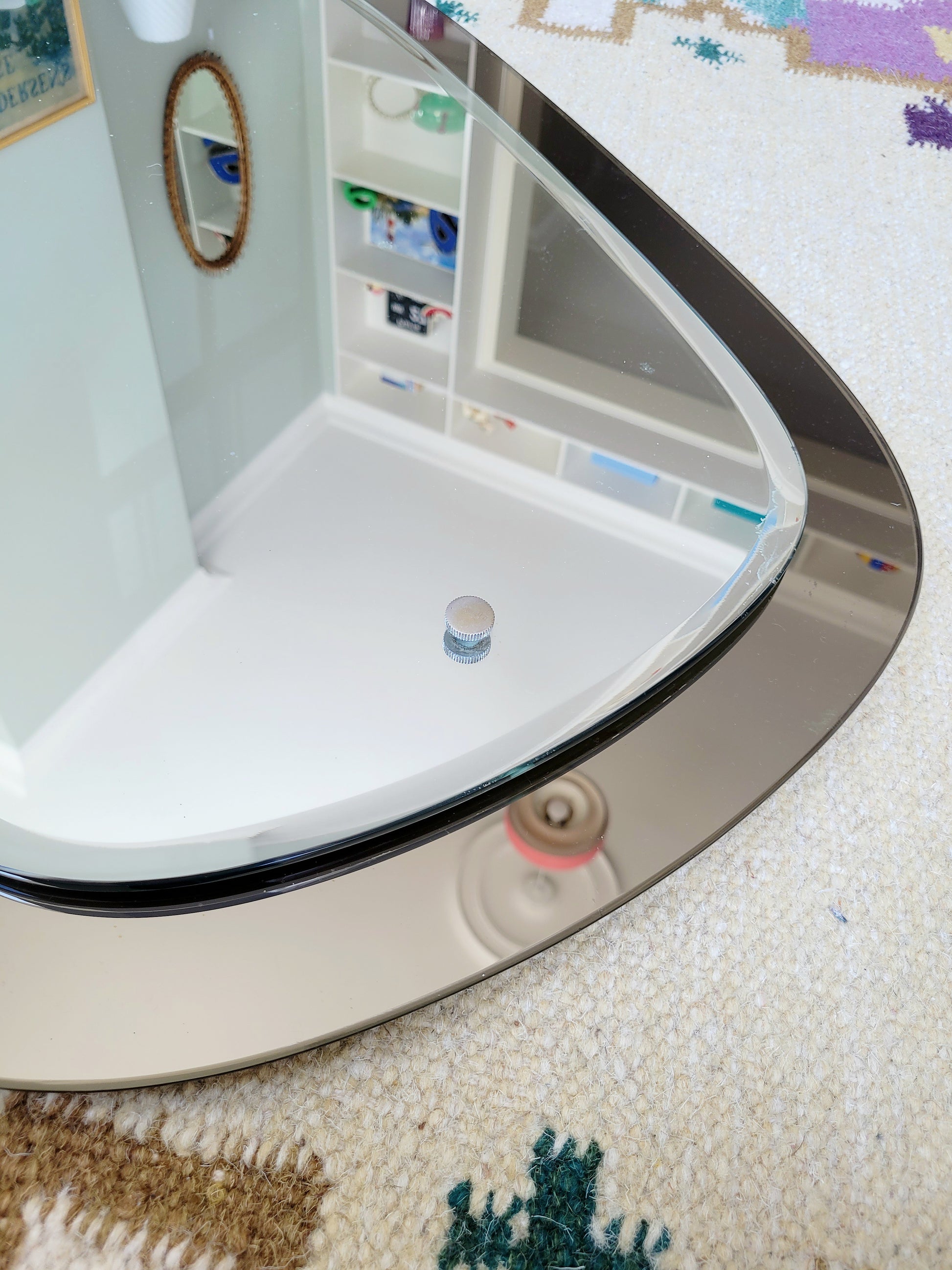  detailed view of a two-tone Italian mirror featuring smoked glass edging 