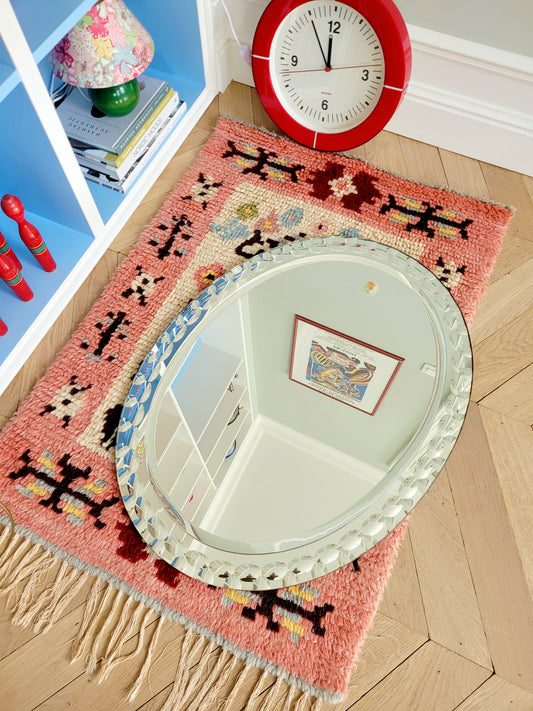 top view of a vintage silver Italian faceted mirror