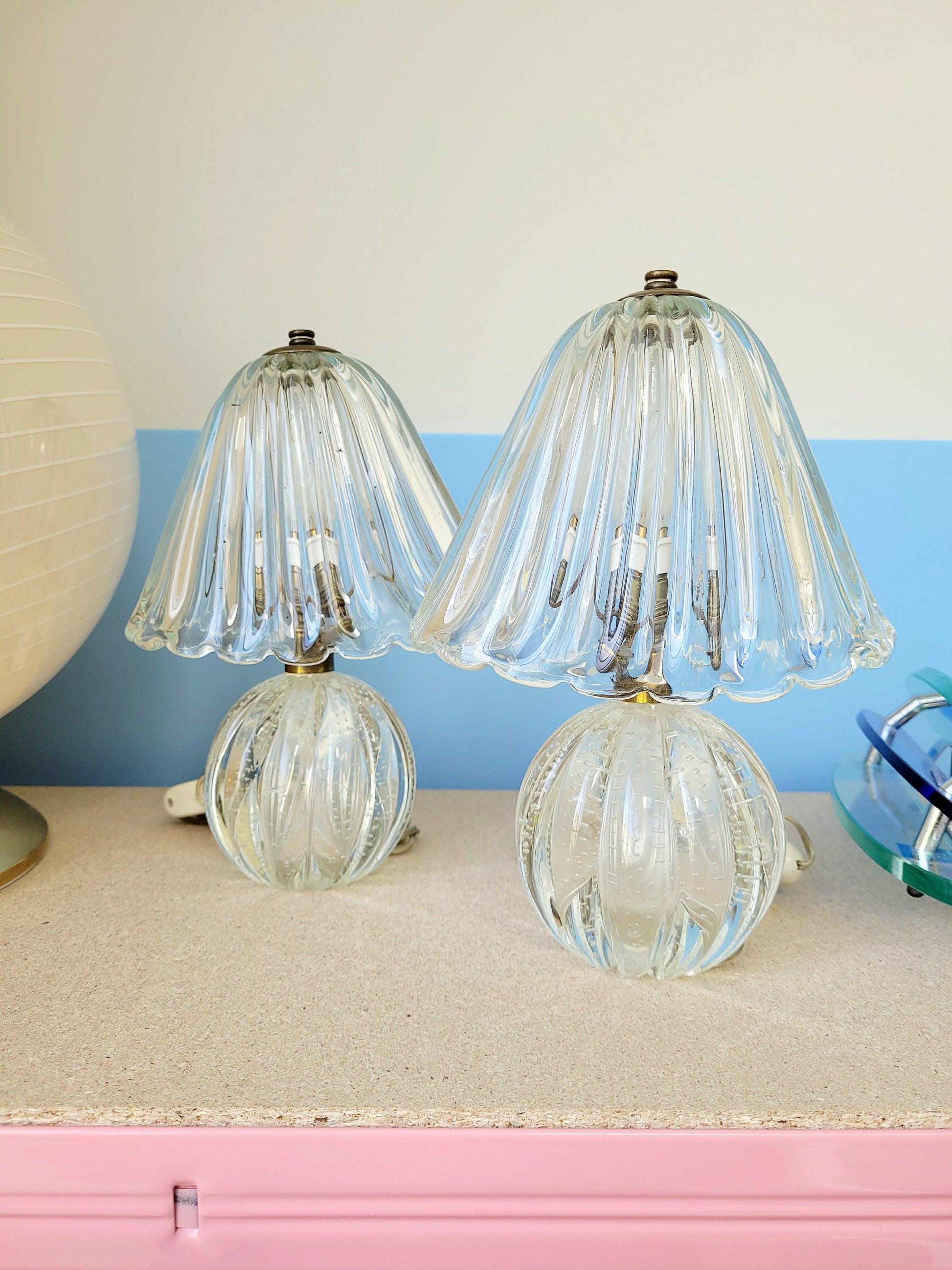 front view of a pair of vintage clear Murano table lamps