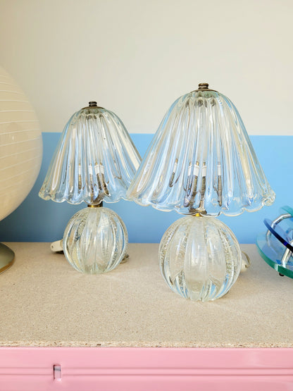 front view of a pair of vintage clear Murano table lamps