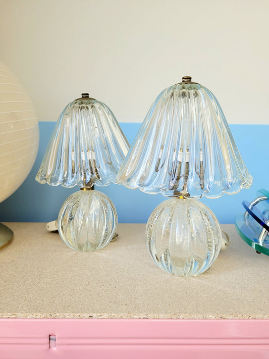 front view of a pair of vintage clear Murano table lamps