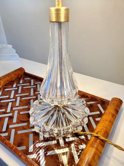 clear Murano glass table lamp feauturing a ribbed shade and brass hardware