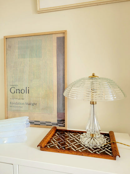 clear Murano glass table lamp feauturing a ribbed shade and brass hardware