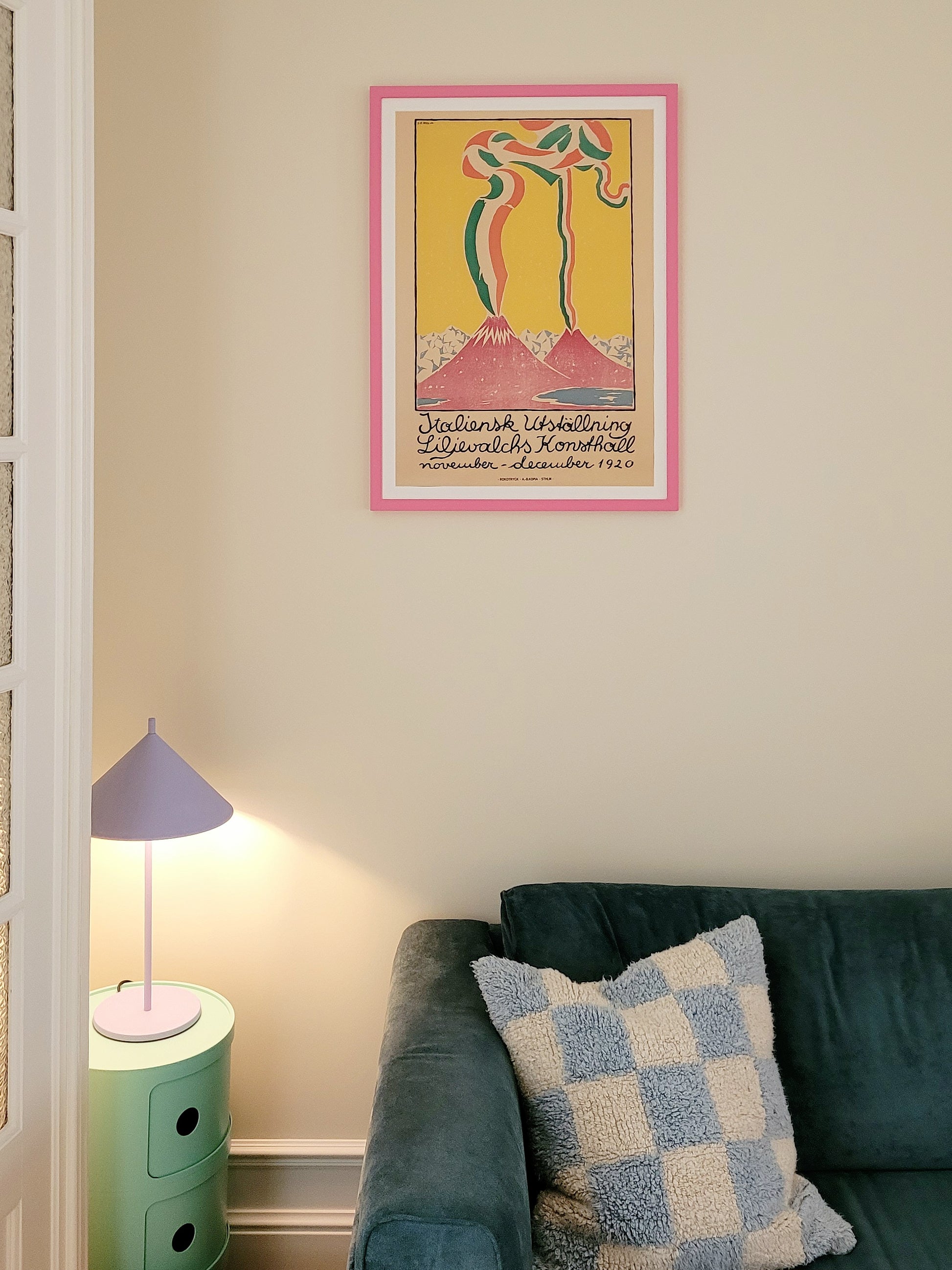 A vintage exhibition poster from Guido Balsamo Stella's show at Liljevalchs art gallery in Sweden in a pink frame