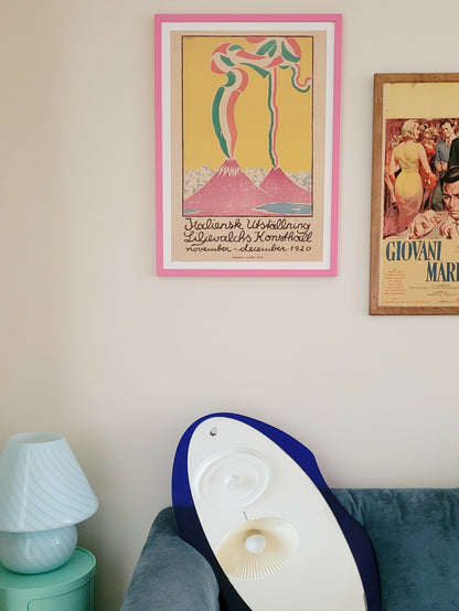 A vintage exhibition poster from Guido Balsamo Stella's show at Liljevalchs art gallery in Sweden in a pink frame