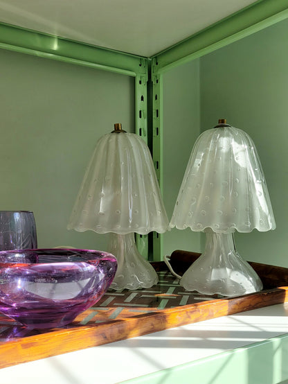 side view of a pair of vintage frosted Murano table lamps
