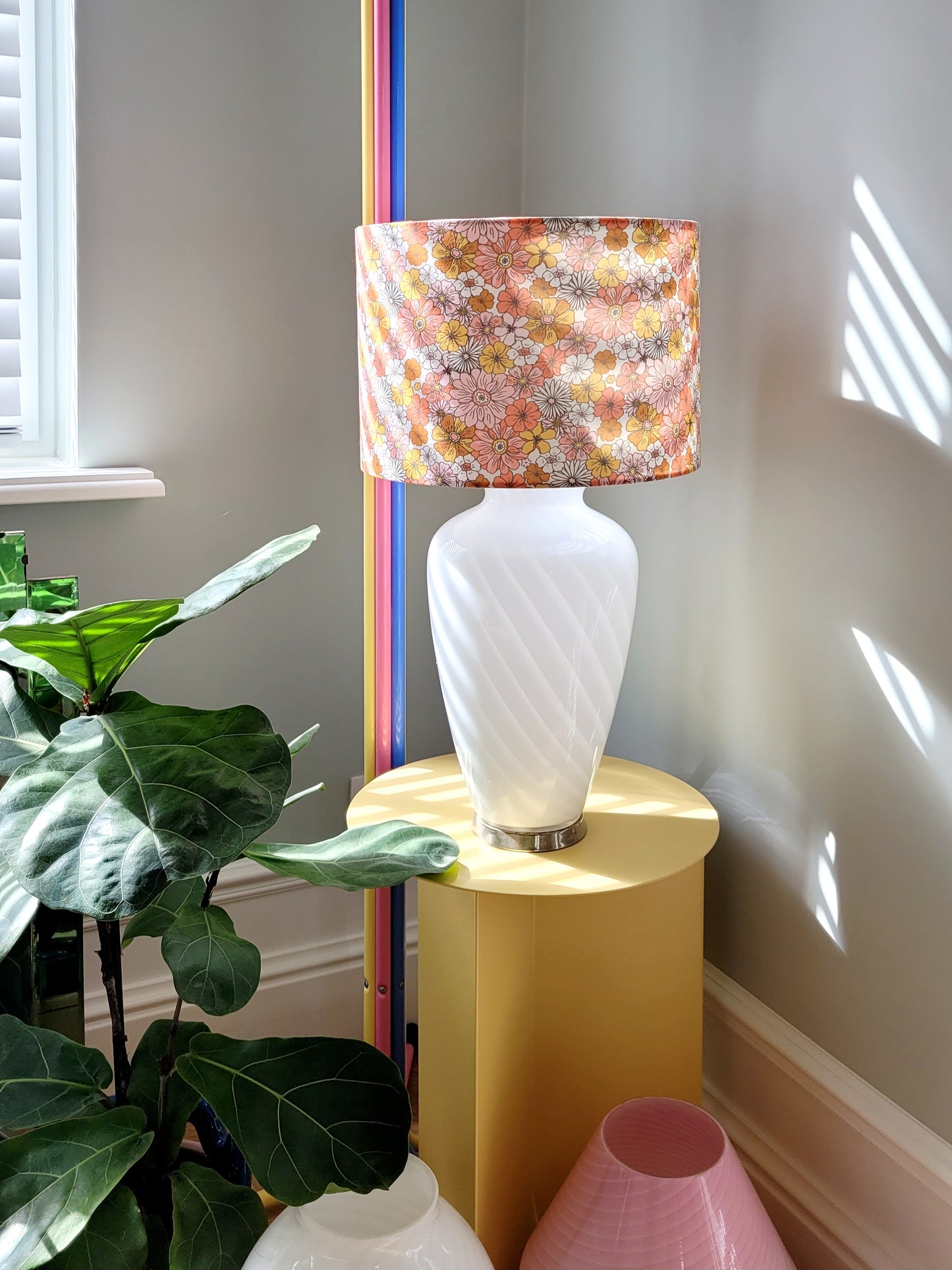 front view of a vintage Murano table lamp with white swirl and lovely floral lamp shade